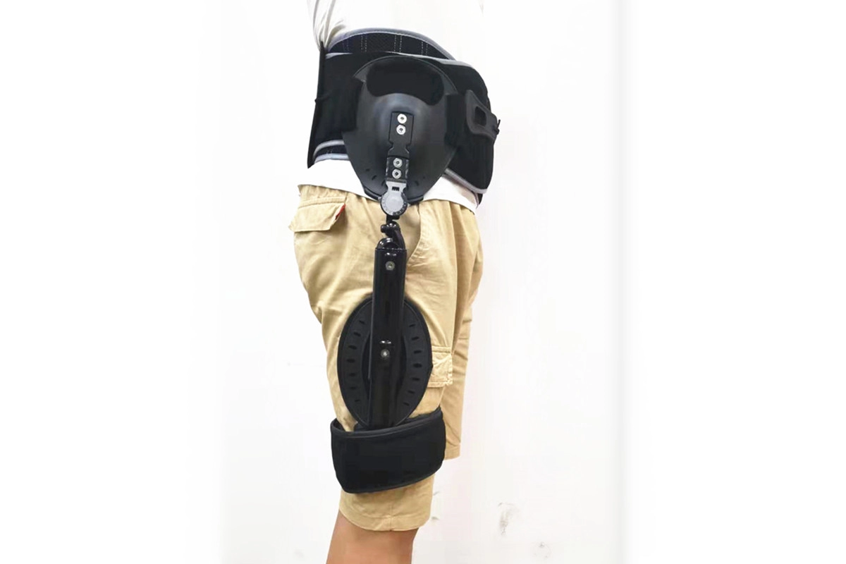 Penculikan pinggul berengsel dengan sabuk pinggang LSO dan sistem ROM untuk penyangga paha kaki