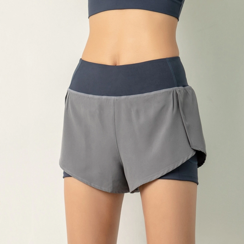 Celana pendek pelatihan pinggang tinggi wanita dengan liner